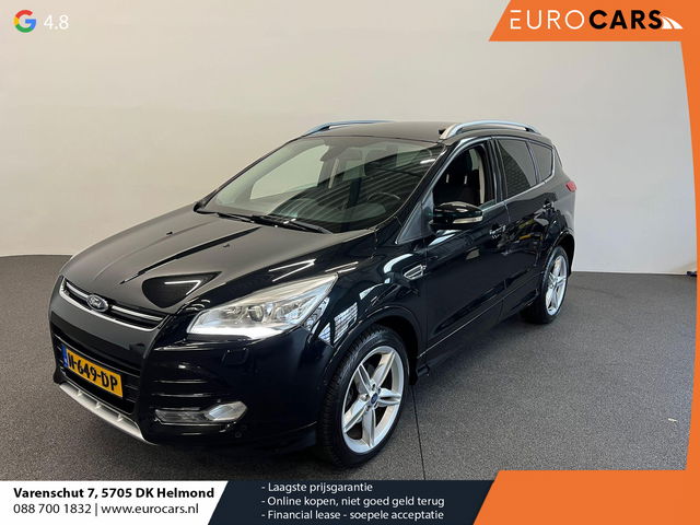 Ford Kuga - 1.5 Titanium Styling Pack Trekhaak Navigatie Camera Parkeersensoren Cruise Control Stoelverwarming Xenon koplampen Half leder Climate Control Lichtmetalen velgen Getinte ramen