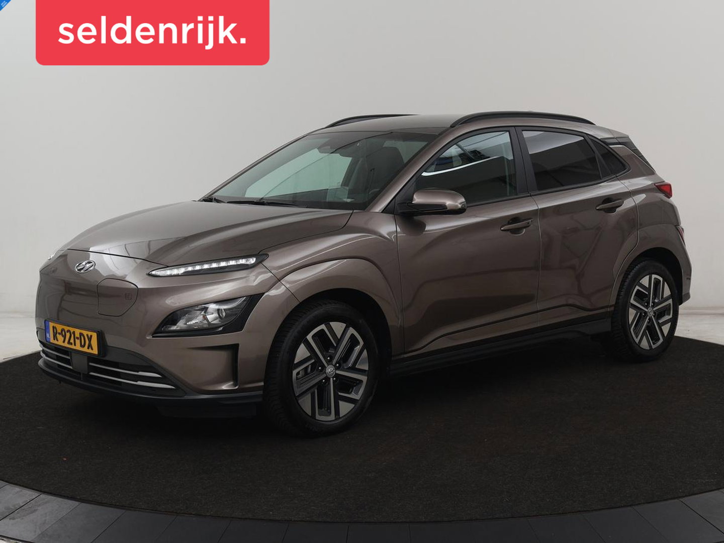 Hyundai KONA EV Fashion 64 kWh | SOH 100% | 3 Fase | Head-Up | Warmtepomp | Adaptive cruise | Camera | Carplay | Keyless | Full LED | Navigatie | Climate control