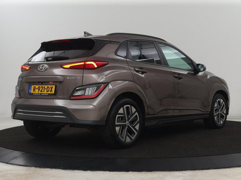 Hyundai KONA EV Fashion 64 kWh | SOH 100% | 3 Fase | Head-Up | Warmtepomp | Adaptive cruise | Camera | Carplay | Keyless | Full LED | Navigatie | Climate control