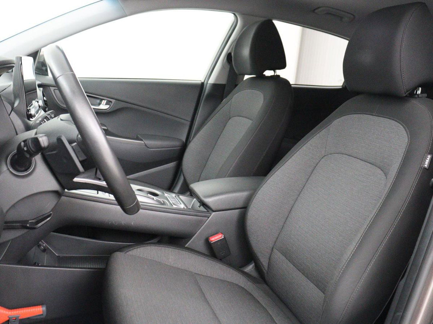 Hyundai KONA EV Fashion 64 kWh | SOH 100% | 3 Fase | Head-Up | Warmtepomp | Adaptive cruise | Camera | Carplay | Keyless | Full LED | Navigatie | Climate control