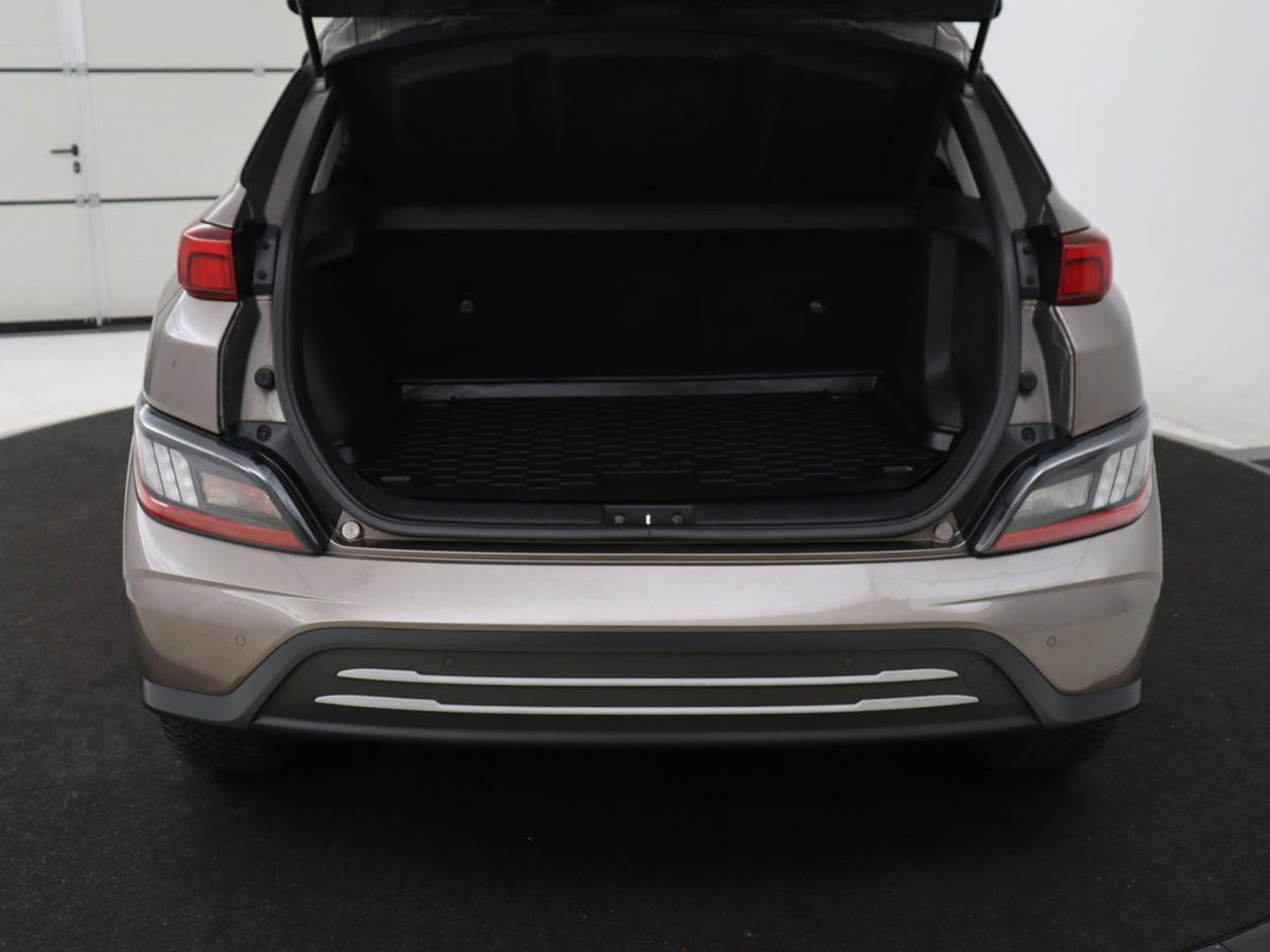 Hyundai KONA EV Fashion 64 kWh | SOH 100% | 3 Fase | Head-Up | Warmtepomp | Adaptive cruise | Camera | Carplay | Keyless | Full LED | Navigatie | Climate control