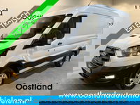 Ford E-Transit - 350 L2H2 Trend 68 kWh / 100% Elektrisch !! / Airco / Cruise Control / CarPlay / Camera / Navigatie / 3-Zits / 5.100 KM !!