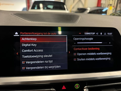 BMW 3 Serie Touring 330i High Executive Pano|HuD|H/K|Memory