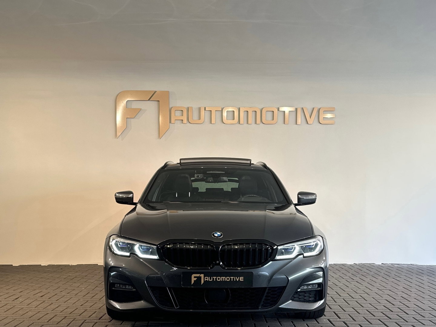 BMW 3 Serie Touring 330i High Executive Pano|HuD|H/K|Memory