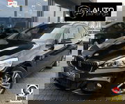 BMW 2 Serie - Active Tourer 218i Centennial High Executive | AUTOMAAT | M Pakket | Head UP | PANO | Achteruitijcamera | Elektrische Achterklep |