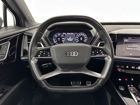 Audi Q4 e-tron 40 S-Line Launch-edition Competition 77 kWh [ 3-Fase-11kW ] {SOH-90%} (INCL-BTW) Aut. *HEATPUMP | PANO | LEATHER | MATRIX-LED | AUDI-SOUND | ADAPTIVE-CRUISE | HEATED-SPORTSEATS | AMBIENTLIGHT | DIGI-COCKPIT | CAMERA | KEYLESS | DAB+ | 20''ALU*