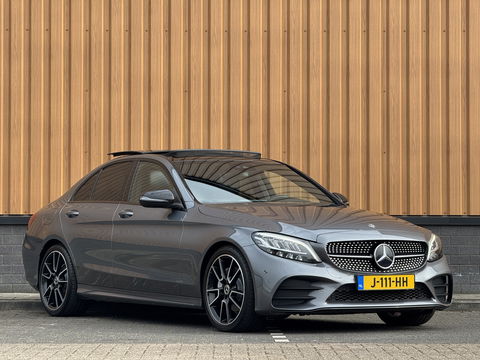 Mercedes-Benz C-Klasse 200 Business Solution AMG Plus Upgrade Edition | Burmester | Panoramadak | Sfeerverlichting | Apple Carplay | Android Auto | Camera | Lane Assist | Dodehoeksensor | LED |