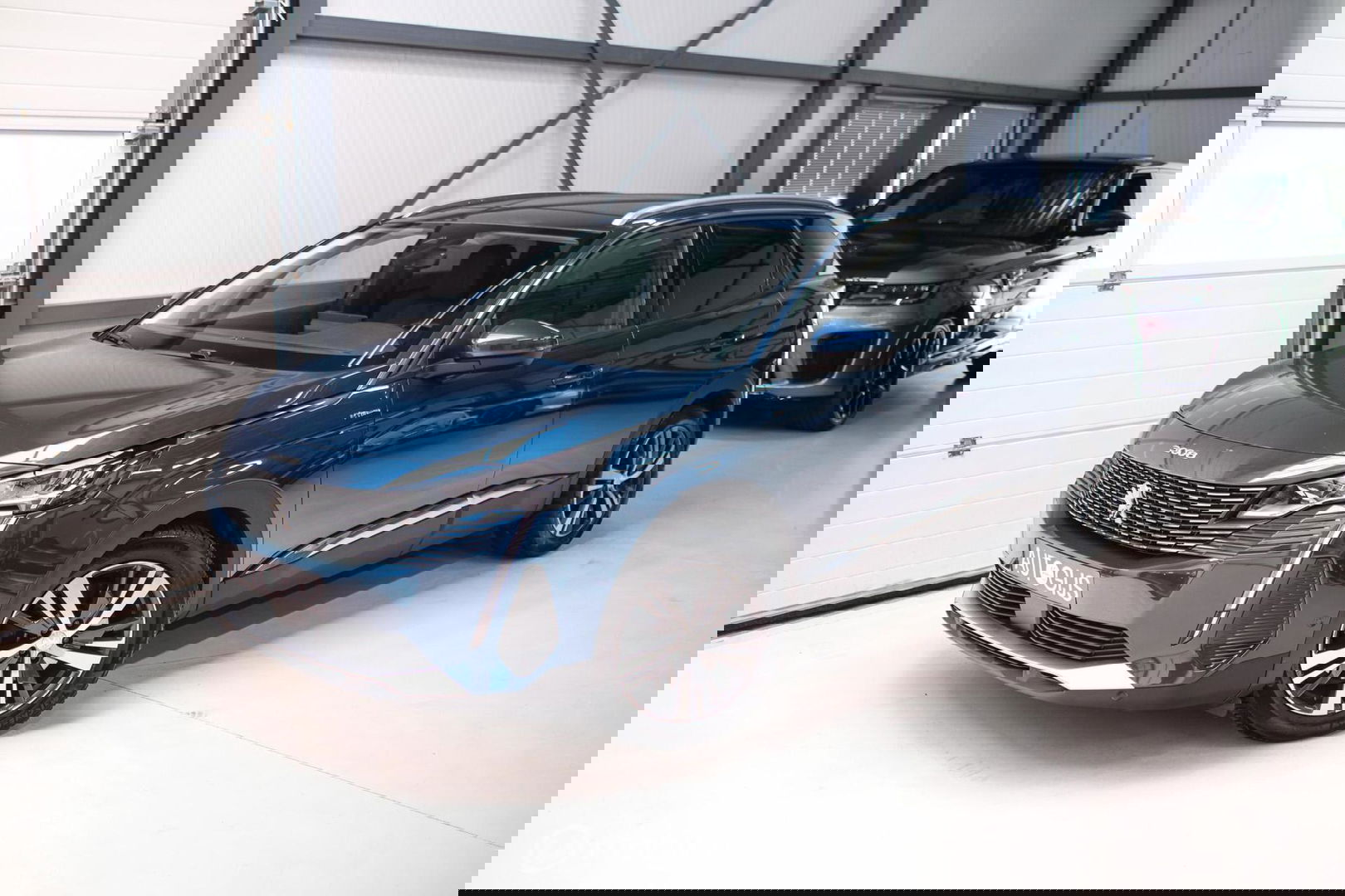 Peugeot 3008 1.6 HYbrid 225 pk Allure | Trekhaak | NL auto | Camera | Leder | HUD | rijklaaprijs | All season banden |