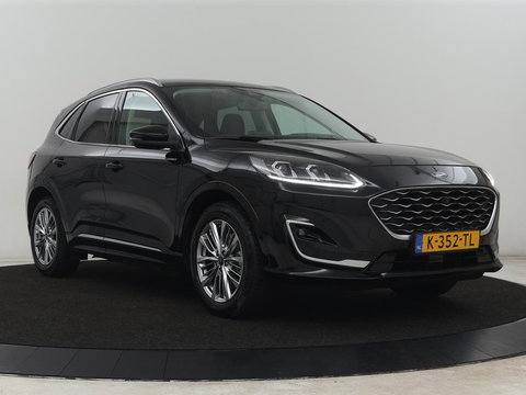 Ford Kuga 2.5 PHEV Vignale | Leder | Head-Up | Stoelverwarming | 360 Camera | Adaptive cruise | Carplay | Achterbankverwarming | 18'' | Navigatie | Full LED | B&O Sound | Park Assist | Keyless | Digital Cockpit | Plug In