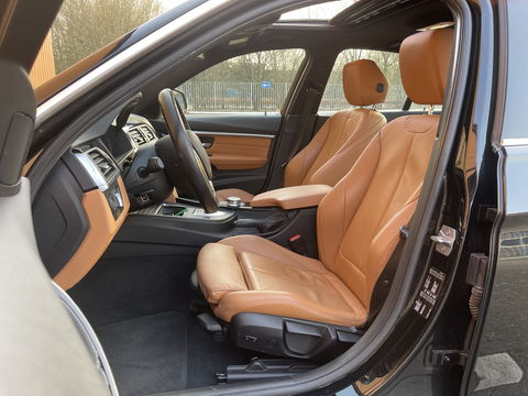 BMW 3-serie 320i Edition Luxury Line Purity Executive | Origineel Nederlands | Panoramadak | Cruise Control | Keyless | Parkeersensoren | Stoelverwarming | Stuurverwarming | Navigatie | Bluetooth