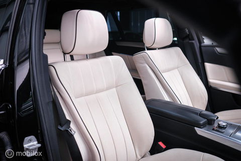 Mercedes-Benz E-Klasse Estate 400 Prestige Elegance 333 pk | Massage | Luchtvering | Stoelkoeling | Leder pakket | Zonneschermen | LED | Trekhaak | Pan