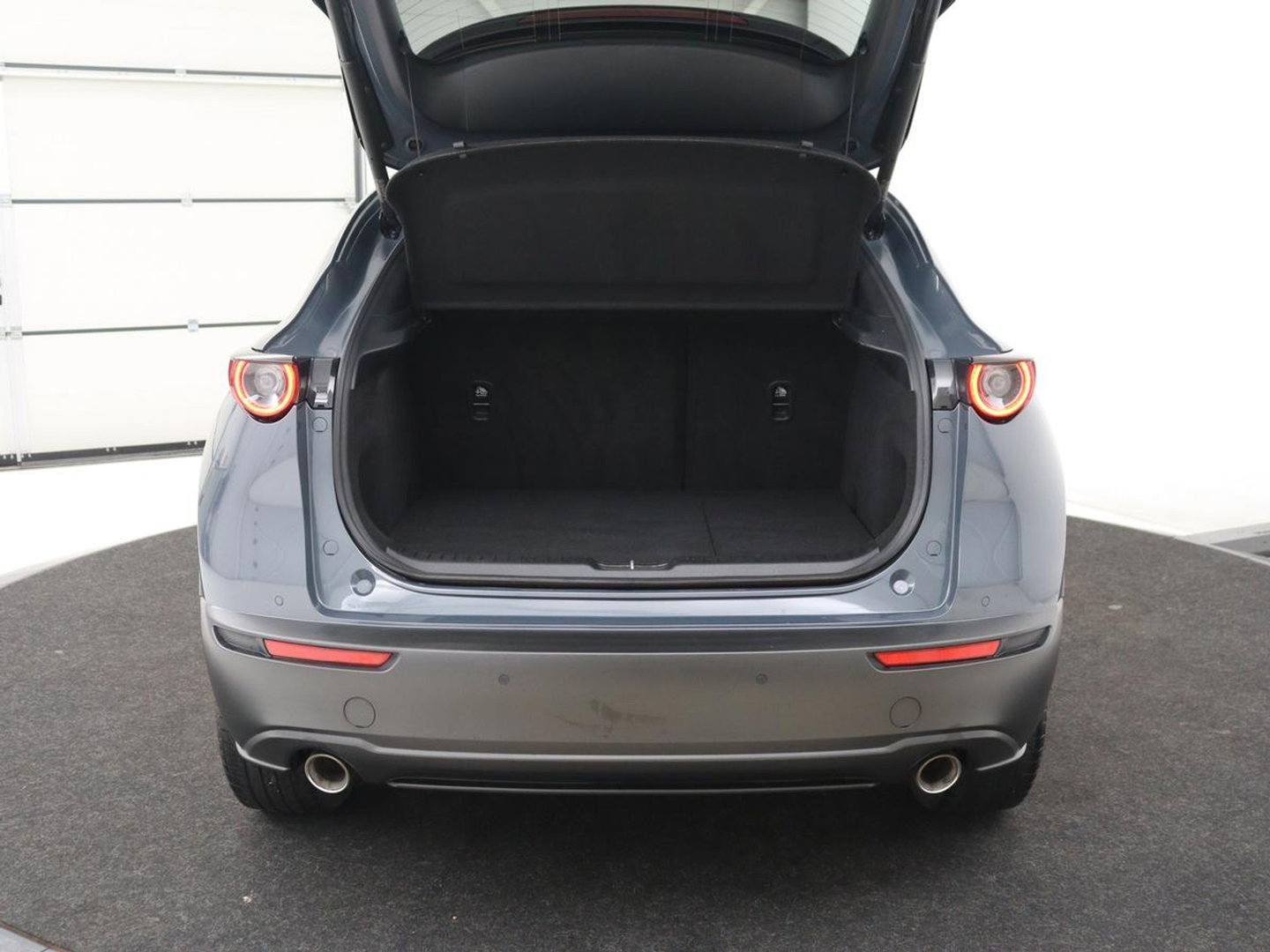 Mazda CX-30 2.0 e-SkyActiv-X M Hybrid Luxury | Leder | Stoelverwarming | Head-Up | Adaptive cruise | Camera | BOSE Sound | Carplay | Navigatie | Keyless | Full LED | Memory | Parkeerhulp