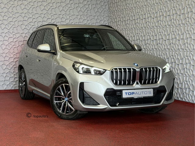 BMW X1 - XDRIVE 25E M-SPORT LED PANO.SCHUIFDAK HEADUP ELEK.KLEP NAVI 360.CAM STOELVERW M-SHADOW LINE ELEK.STOEL ZWARTE.HEMEL 06/2025 PHEV PLUG IN HYBRID AWD 4X4 4WD ✅ Top Auto's. Al 30 Jaar uw Bmw Specialist in ,  BMW M / M Sport / PHEV / HEV / Hybrid / Mhev / 25e