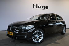 BMW 1 Serie - 118i EDE Corporate Lease Essential Automaat Clima Navigatie Rijklaarprijs Inruil Mogelijk!