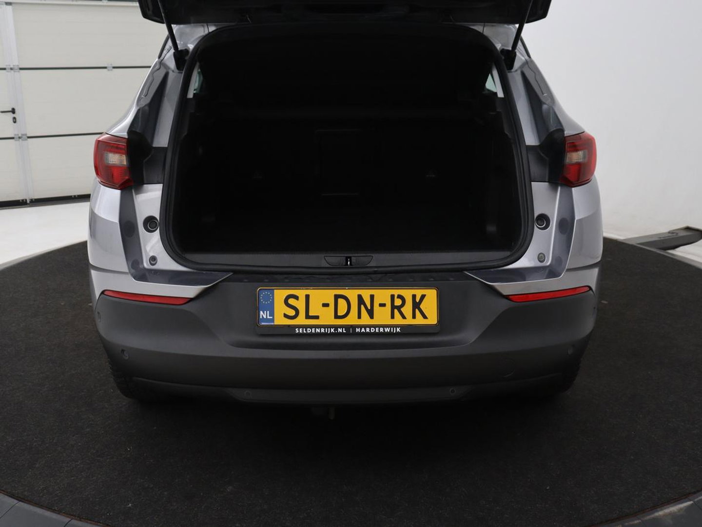 Opel Grandland X 1.6 Turbo Hybrid Elegance | SOH 96% | Leder | Adaptive cruise | Trekhaak | Stuurverwarming | Carplay | Navigatie | Full LED | Camera | Climate control | PHEV | Plug In