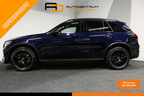 Mercedes-Benz GLC 300e 4MATIC AMG Line / Panamericana Grille / Panoramadak / Elektr. verstelbare voorstoelen + memory / Apple Carplay - Android Auto / Sfeerverlichting / Rondomzichtcamera / MANUFAKTUR kleur / Elektr. wegklapbare trekhaak / 21'' LMV / Keyless / LED High Per
