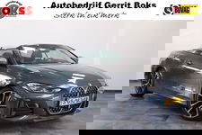 BMW 4 Serie - Cabrio M440i xDrive High-Executive 374PK Individueel-lak Navigatie  Volleder 19LMV Head up