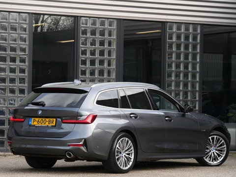 BMW 3 Serie Touring 320e LEER/ CAMERA/ ELEKT. KLEP/ SFEERVERLICHTING/ 18" BREEDSET MET 4 NIEUWE ALL-SEASON BANDEN