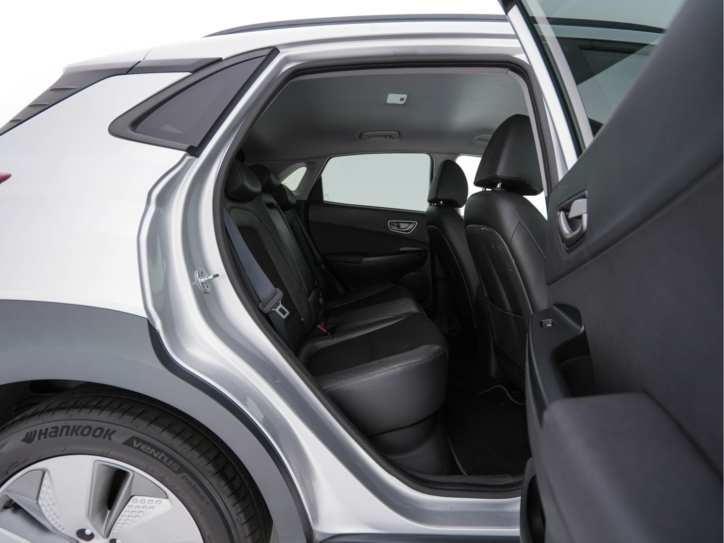 Hyundai KONA EV Fashion 64 kWh (3-Fase) {SOH-100%} (INCL-BTW)  Aut * HEATPUMP | NAVI-FULLMAP | LEATHER-FABRIC | KEYLESS | CAMERA | DAB | ECC | PDC | ADAPTIVE-CRUISE | LANE-ASSIST | HEATED SEATS | PRIVACY-GLASS | HEAD-UP | SHIFT-PADDLES | 17"A