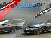 BMW 3 Serie - Touring 320e M Sport Laser Licht Trekhaak Stuurwielverwarming Carplay Achteruitrijcamera Keyless Entry