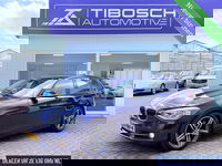 BMW 1 Serie - 118i AUT. Sport Xenon Leder Harman / Kardon Navi