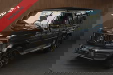 Mercedes-Benz G-Klasse - G63 AMG Panodak Carbon Burmester Leer 360 PTS Open dak Navi Memory Stoelventilatie Stoelverwarming Climate NL auto