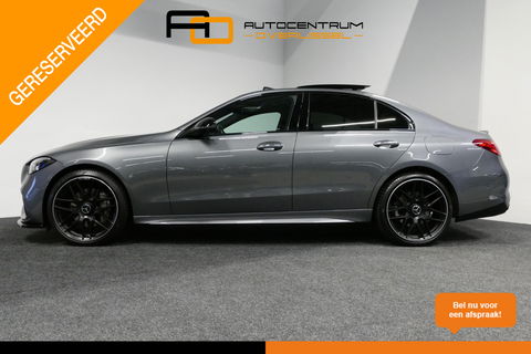 Mercedes-Benz C-Klasse 300 e AMG Line / C63s AMG Diffuser / Panamericana Grille / Panoramadak / Elektr. verstelbare voorstoelen + memory / Digital Light (Laser) / Stoelverwarming / Ambienteverlichting Plus / Apple Carplay - Android Auto / Rondomzichtcamera / HUD / 20'' LMV / Ac