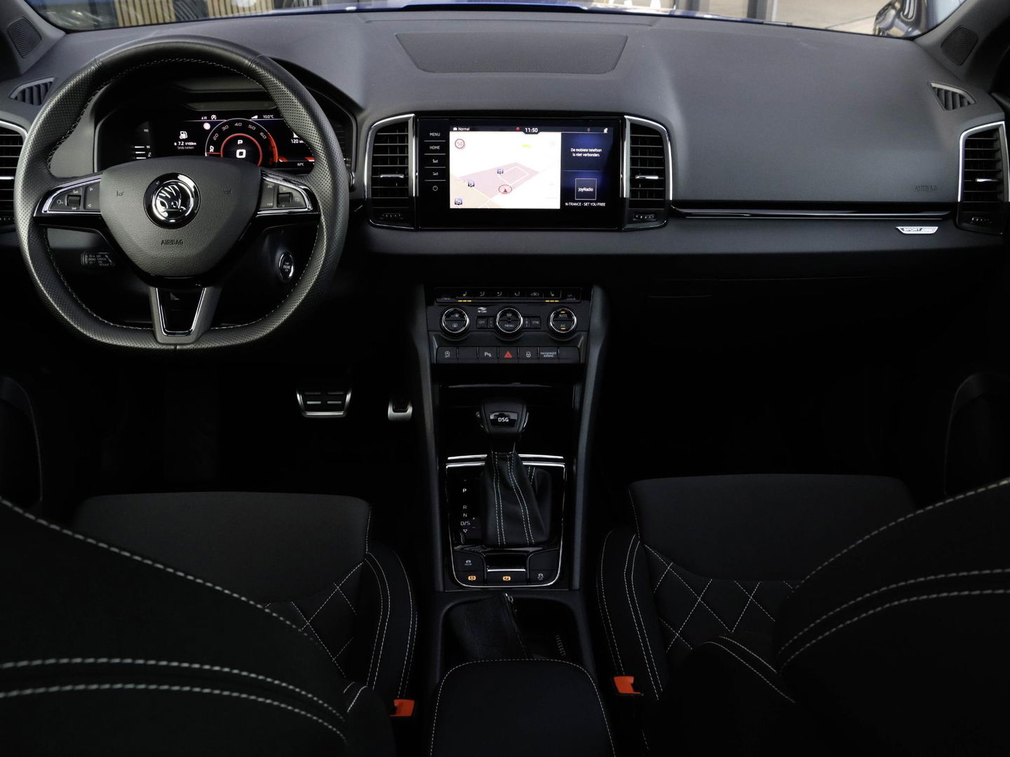 Škoda Karoq 1.5 TSI ACT Sportline DSG Pano Adapt. Cruise Trekhaak Camera Race Blue