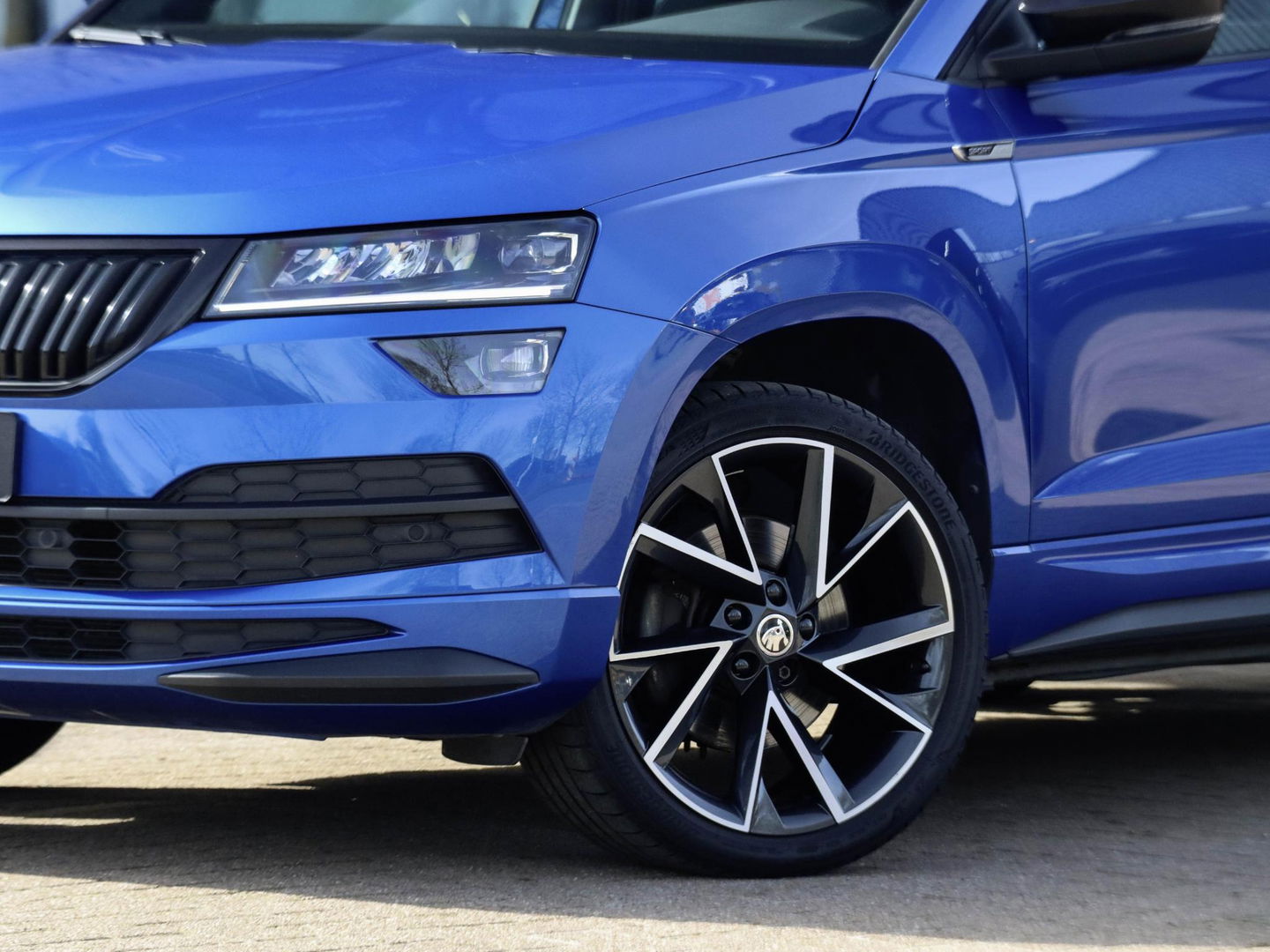 Škoda Karoq 1.5 TSI ACT Sportline DSG Pano Adapt. Cruise Trekhaak Camera Race Blue