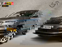 Škoda Karoq - 1.0 TSI Sport Automaat (PANORAMADAK, APPLE CARPLAY, GROOT NAVI, CLIMATE, CAMERA, STOELVERWARMING, SPORTSTOELEN, GETINT GLAS, ADAPTIVE CRUISE, NIEUWE APK, NIEUWSTAAT)