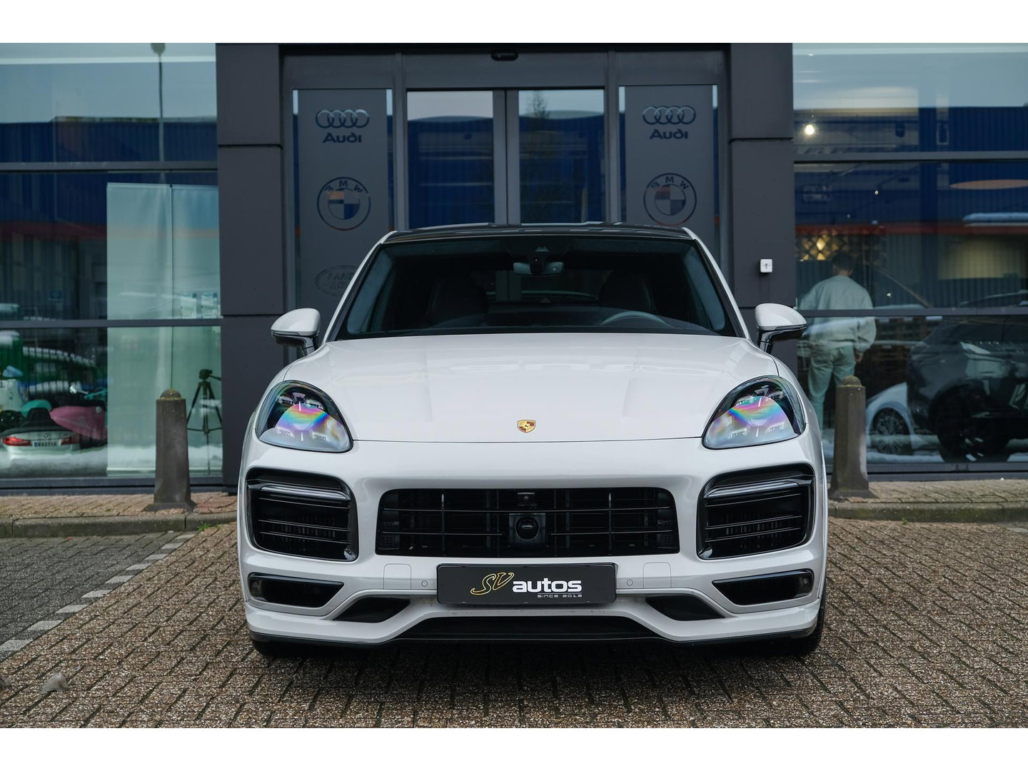 Porsche Cayenne Coupé 3.0 E-Hybrid 462PK Krijtgrijs SportDesign Luchtvering *SOH 82%* Lightweight Package Carbon Dak 4-wielsturing NLauto