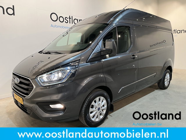 Ford Transit Custom - 320 2.0 TDCI L2H2 Limited / Euro 6 / Airco / Camera / Cruise Control / CarPlay / navigatie / 3-Zits / 28.000 KM !!