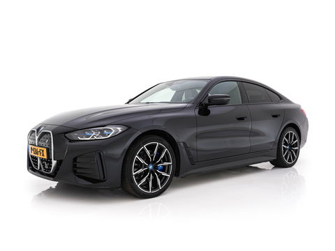 BMW i4 eDrive40 High Executive 84 kWh M-Sportpack [ 3-Fase ] {SOH-93%} (INCL.BTW)  Aut *LEATHER | HEAD UP | FULL-LED | HIFI-SOUND | CRUISE | WIDESCREEN-COCKPIT | DAB+ | CAMERA | AMBIENTLIGHT | CARPLAY | HEATED-SPORTSEATS | PRIVACY-GLASS | 19''ALU*