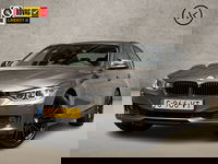 BMW 3 Serie - 320i High Executive 184Pk Automaat (GROOT NAVI, CLIMATE, SFEERVERLICHTING, MEMORY SEATS, CRUISE, PARKEERSENSOREN, NIEUWSTAAT)