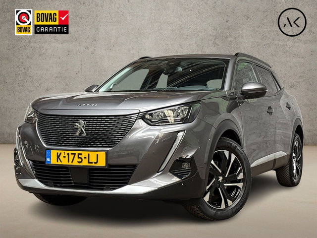 Peugeot 2008 - 1.2 PureTech Allure Sport (VIRTUAL COCKPIT, APPLE CARPLAY, 360 CAMERA, LEDER, KEYLESS, SPORTSTOELEN, GETINT GLAS, LM VELGEN, NIEUWSTAAT)