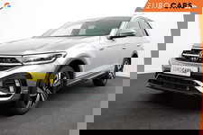 Volkswagen T-Roc - 1.5 TSI 150pk DSG R-Line | Navigatie | Apple Carplay/Android Auto | Parkeersensoren | Camera | Blind Spot Assist | Adaptive Cruise Control | Elektrische achterklep | Stoel- en stuurverwarming | Climate Control | Ledverlichting | Virtual Cockpit