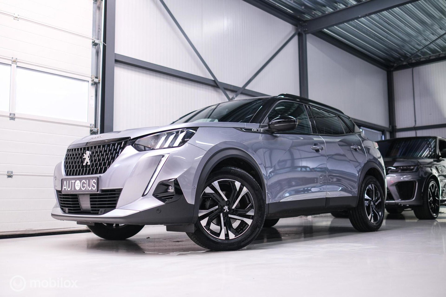 Peugeot 2008 1.2 PureTech GT | Panorama | Trekhaak | Camera | LED | Dealer OH | Nieuwe distributie | rijklaar |