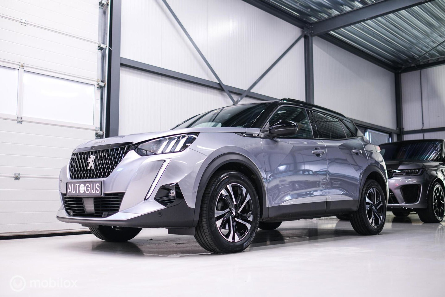 Peugeot 2008 1.2 PureTech GT | Panorama | Trekhaak | Camera | LED | Dealer OH | Nieuwe distributie | rijklaar |