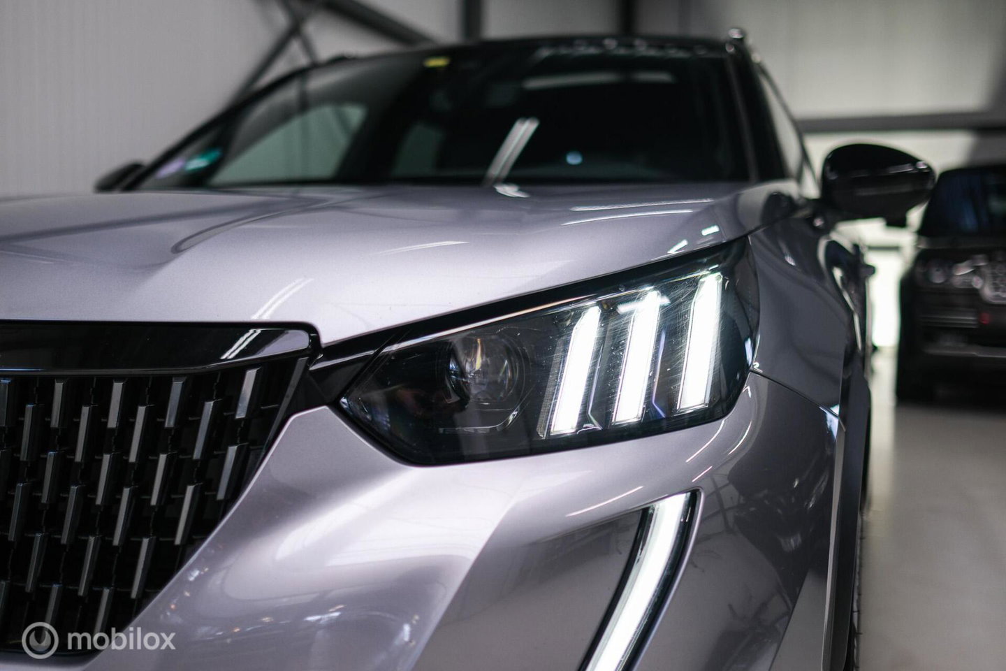 Peugeot 2008 1.2 PureTech GT | Panorama | Trekhaak | Camera | LED | Dealer OH | Nieuwe distributie | rijklaar |