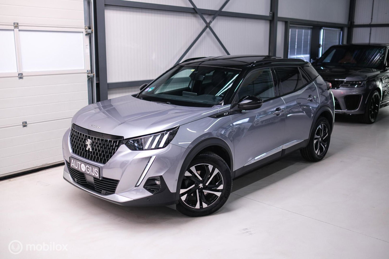 Peugeot 2008 1.2 PureTech GT | Panorama | Trekhaak | Camera | LED | Dealer OH | Nieuwe distributie | rijklaar |