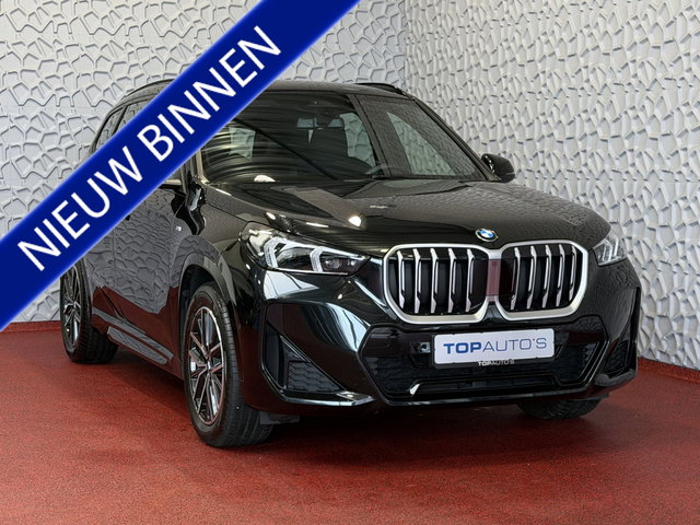 BMW X1 - SDRIVE M-SPORT SHADOW LINE NAVI LED ELEK.KLEP CRUISE LEER/ALCANTARA CAMERA M-SPORT INTERIEUR / EXTERIEUR ✅ Top Auto's. Al 30 Jaar uw Bmw Specialist in ,  BMW M / M Sport / PHEV / HEV / Hybrid / Mhev / 25e / 30e / xDrive25e // xDrive30e / sDrive18i / sDriv