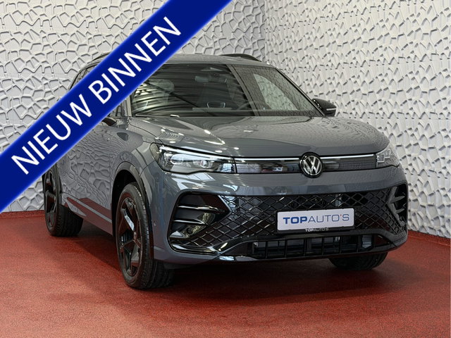 Volkswagen Tiguan - 1.5 eHYBRID 272 PK NW AUTO R-LINE VW.TREKHAAK BLACK PANO XL.NAVI STOEL/STUUR VERW. BLACK.STYLE 360.CAM ELEK.KLEP MATRIX.LED 20''LMV MASSAGE SCHUIFDAK PHEV PLUG IN HYBRID ✅Top Auto's Wijchen , 30 Jaar Specialist in Volkswagen  : Alle Type's : R-Line Editio