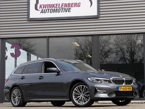 BMW 3 Serie Touring 320e LEER/ CAMERA/ ELEKT. KLEP/ SFEERVERLICHTING/ 18" BREEDSET MET 4 NIEUWE ALL-SEASON BANDEN