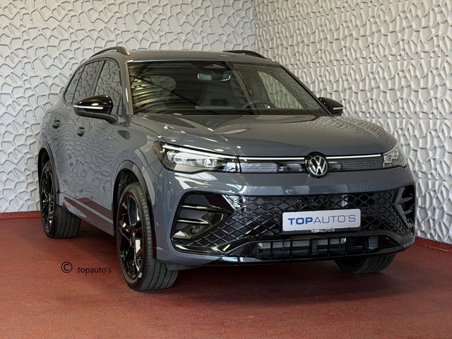 Volkswagen Tiguan - 1.5 eHYBRID 272 PK NW AUTO R-LINE VW.TREKHAAK BLACK PANO XL.NAVI STOEL/STUUR VERW. BLACK.STYLE 360.CAM ELEK.KLEP MATRIX.LED 20''LMV MASSAGE SCHUIFDAK PHEV PLUG IN HYBRID ✅Top Auto's Wijchen , 30 Jaar Specialist in Volkswagen  : Alle Type's : R-Line Editio
