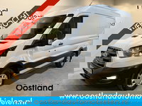 Ford E-Transit - 390 (3500 kg) L2H2 Trend 68 kWh / 100% Elektrisch !! / Airco / Cruise Control / CarPlay / Camera / Navigatie / 3-Zits / 5.100 KM !!