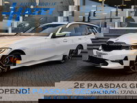 BMW 3 Serie - Touring 320d HIGH EXECUTIVE SPORTLINE 190 PK AUT. *ALPINWEISS* + ELEK. TREKHAAK | LASER LED | 18 INCH | STOEL/STUURWIELVERW.