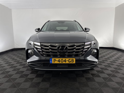 Hyundai Tucson 1.6 T-GDI PHEV Comfort Smart 4WD (INCL.BTW) *LEATHER | FULL-LED | ADAPTIVE-CRUISE | HEATED-COMFORTSEATS | KEYLESS | CAMERA | DIGI-COCKPIT | PRIVACY-GLASS | SHIFT-PADDLES | ECC | PDC | 19''ALU*