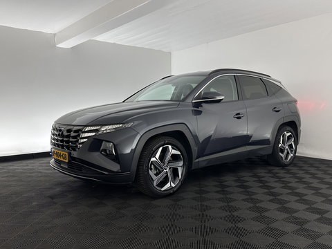 Hyundai Tucson 1.6 T-GDI PHEV Comfort Smart 4WD (INCL.BTW) *LEATHER | FULL-LED | ADAPTIVE-CRUISE | HEATED-COMFORTSEATS | KEYLESS | CAMERA | DIGI-COCKPIT | PRIVACY-GLASS | SHIFT-PADDLES | ECC | PDC | 19''ALU*