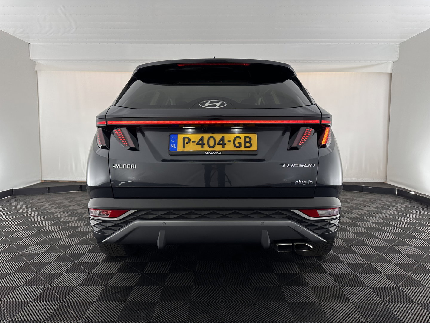 Hyundai Tucson 1.6 T-GDI PHEV Comfort Smart 4WD (INCL.BTW) *LEATHER | FULL-LED | ADAPTIVE-CRUISE | HEATED-COMFORTSEATS | KEYLESS | CAMERA | DIGI-COCKPIT | PRIVACY-GLASS | SHIFT-PADDLES | ECC | PDC | 19''ALU*