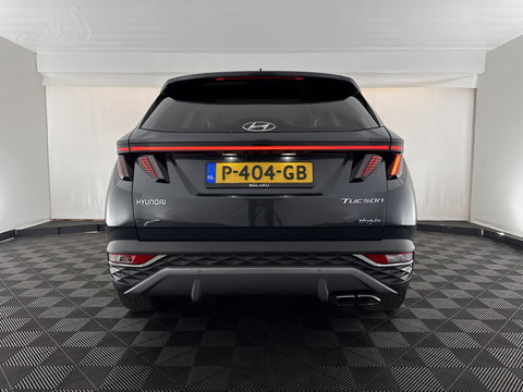 Hyundai Tucson 1.6 T-GDI PHEV Comfort Smart 4WD (INCL.BTW) *LEATHER | FULL-LED | ADAPTIVE-CRUISE | HEATED-COMFORTSEATS | KEYLESS | CAMERA | DIGI-COCKPIT | PRIVACY-GLASS | SHIFT-PADDLES | ECC | PDC | 19''ALU*